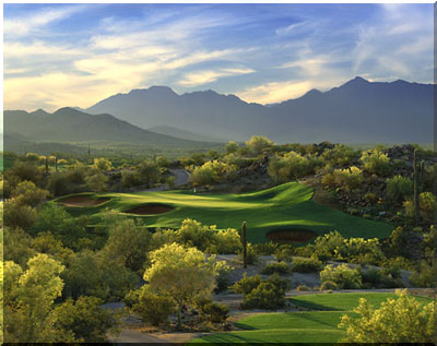 View of a picturesque golf course with mountain views.