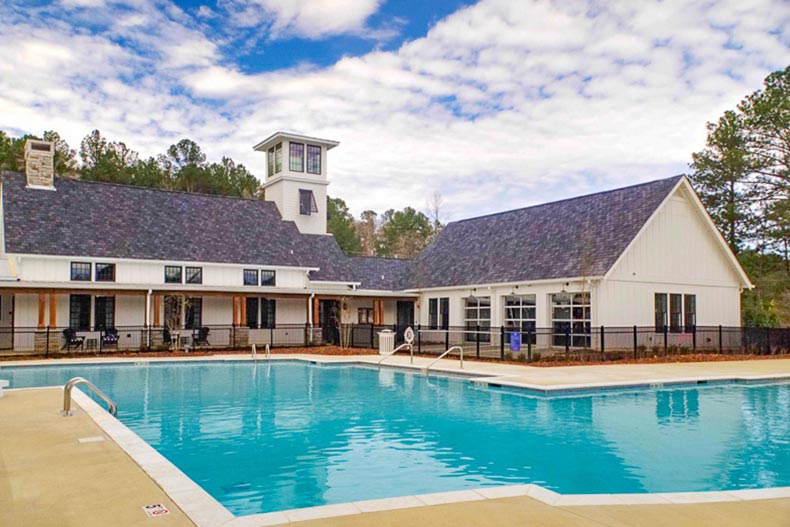 The clubhouse and outdoor pool at Abingdon at Lake Wilborn in Hoover, Alabama