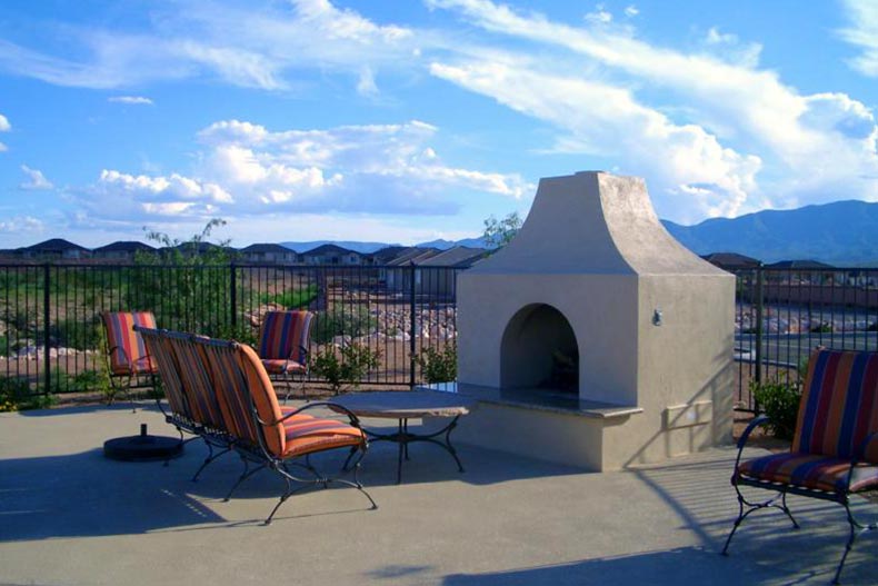 Chairs on an outdoor patio overlooking the Arizona desert at Dorado at Verde Santa Fe in Cornville, Arizona