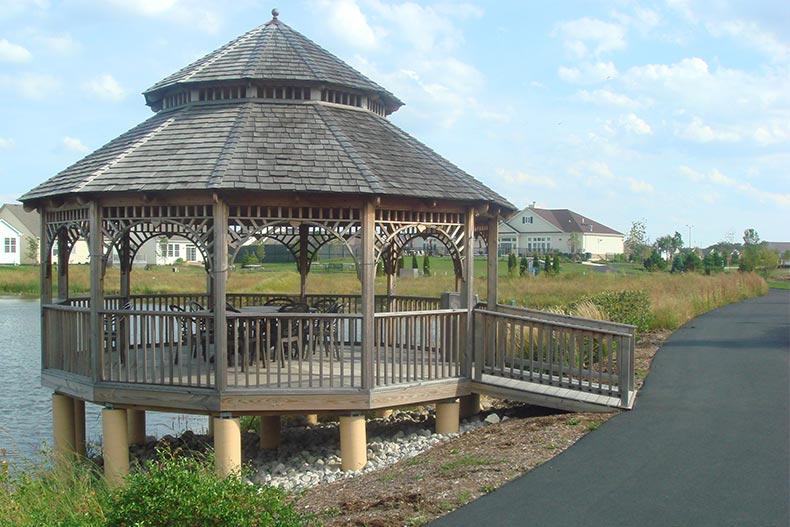 A gazebo overlooking a pond at Carillon at Stone Gate in Aurora, Illinois