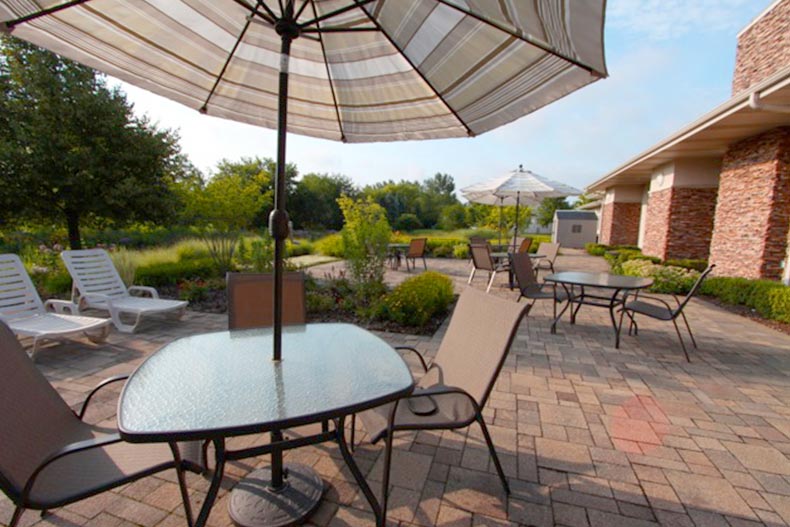 Photo of a patio table next to the clubhouse in Carillon North in Grayslake, Illinois