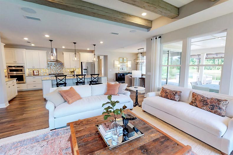 Interior view of a living room in a model home at Del Webb BayView in Palmetto, Florida