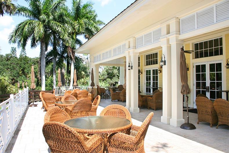 Dining tables on the outdoor patio at Verandah in Fort Myers, Florida