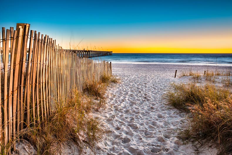 Sunset view of the beach and pier in Panama City, Florida