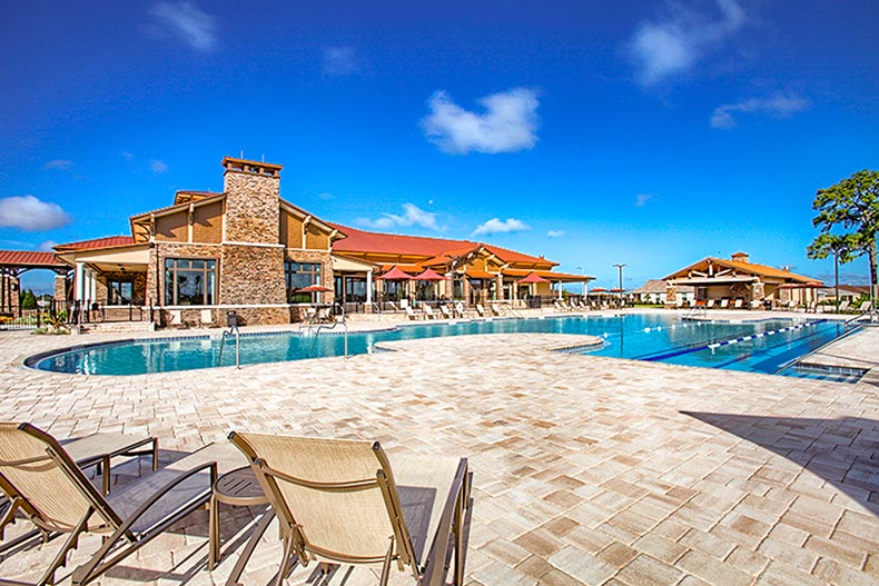 View of the outdoor pool and patio at The Lodge at Candler Hills at On Top of the World in Ocala, Florida