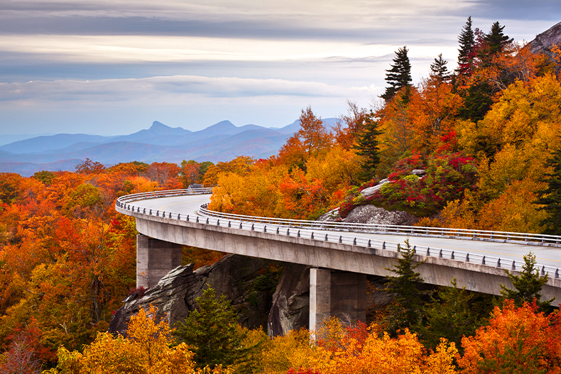 Blue Ridge Parkway road wrapping around the Grandfather Mountain during autumn, located in Western North Carolina