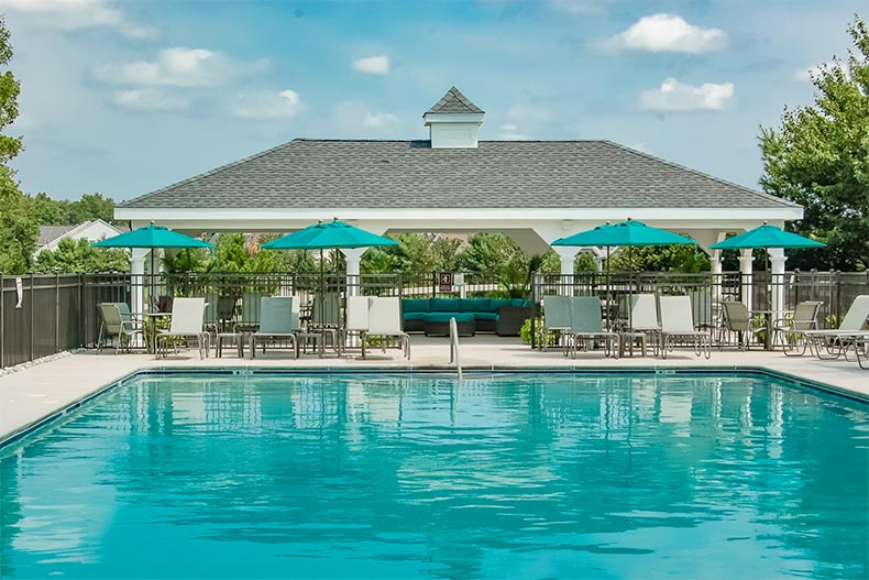 The outdoor pool and patio at Horizons at Barnegat in Barnegat, New Jersey