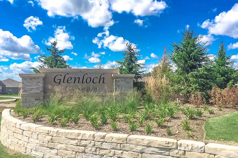 A blue sky over the community sign for Andaré at Glenloch in Algonquin, Illinois
