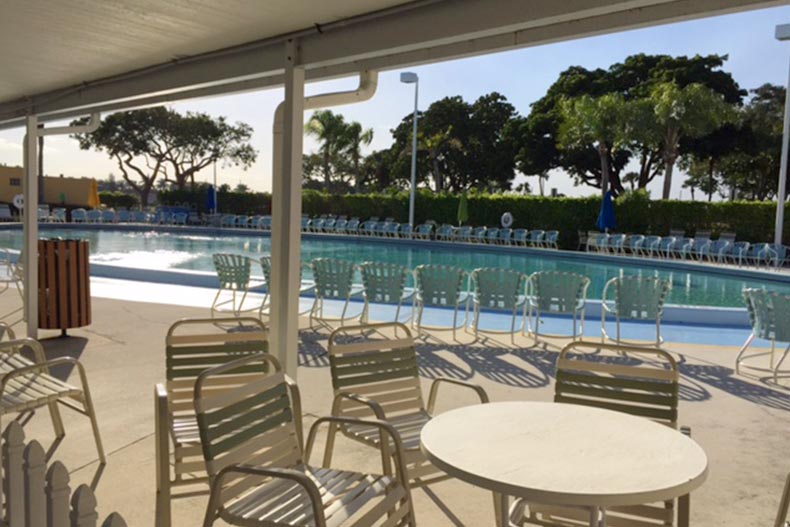 The outdoor pool and patio at Kings Point in Delray Beach in Delray Beach, Florida