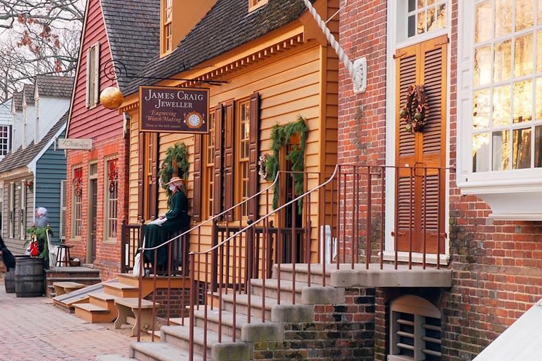 Christmas holly and wreaths adorning the Colonial doors in Williamsburg, Virginia