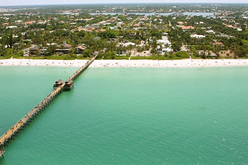 Aerial view of a beach and boardwalk in Naples, Florida