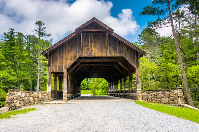 Blue sky over the covered bridge above High Falls in Dupont State Forest, North Carolina