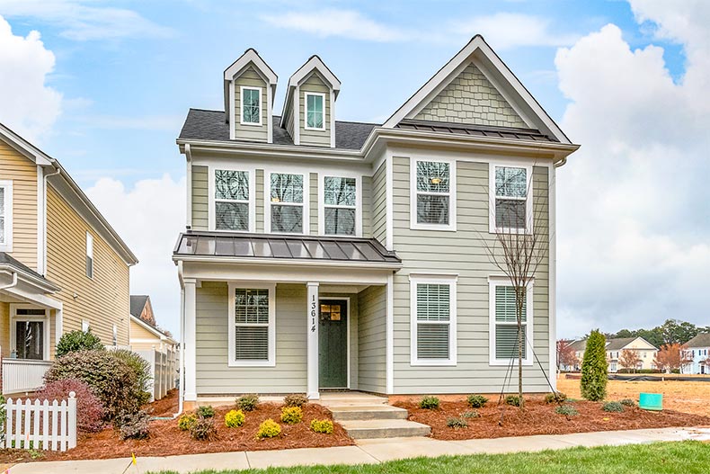 Exterior view of a model home at The Commons at Monteith Park in Huntersville, North Carolina