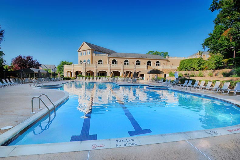 Exterior view of the clubhouse and outdoor pool at Fox Hills in Rockaway, New Jersey