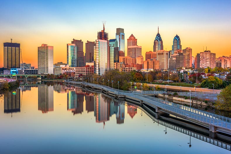 The downtown skyline of Philadelphia, Pennsylvania at dusk on the Schuylkill River