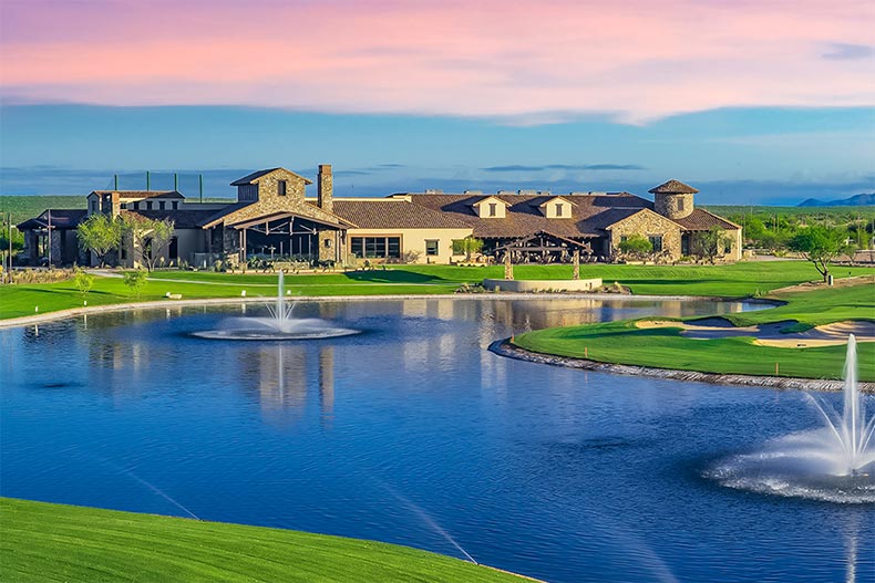 The golf course, pond, and clubhouse at SaddleBrooke Ranch in Oracle, Arizona