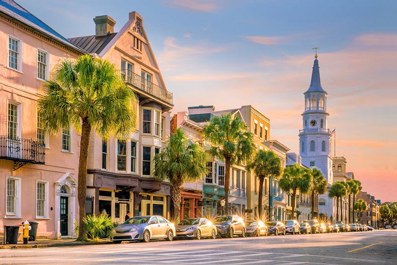 Palm trees lining the street in the historic downtown area of Charleston, South Carolina at sunset