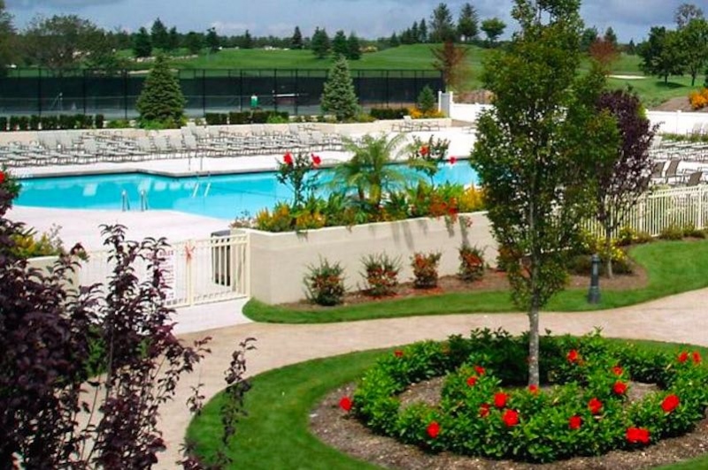 Outdoors, a pool and patio helps everyone at The Greens at Half Hollow enjoy the warmer months.