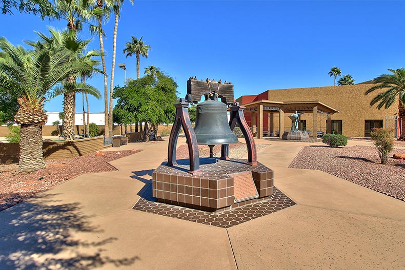 A historic bell on a walkway at Sun City in Arizona