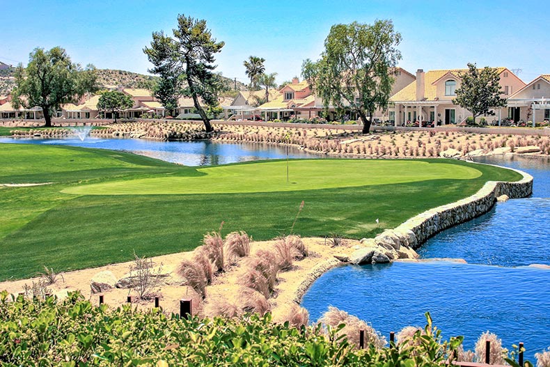 Houses beside a stream near the golf course at Sun Lakes Country Club in Banning, California