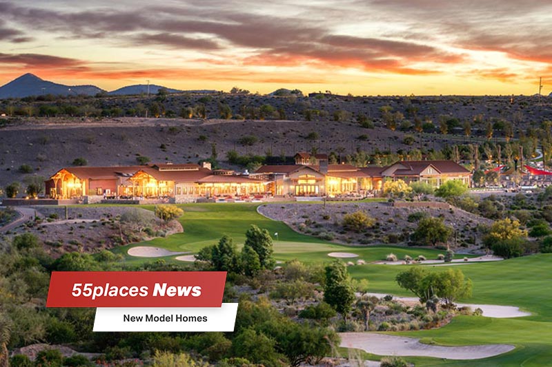 "New Model Homes" banner over an aerial view of the golf course at Trilogy at Wickenburg Ranch in Wickenburg, Arizona