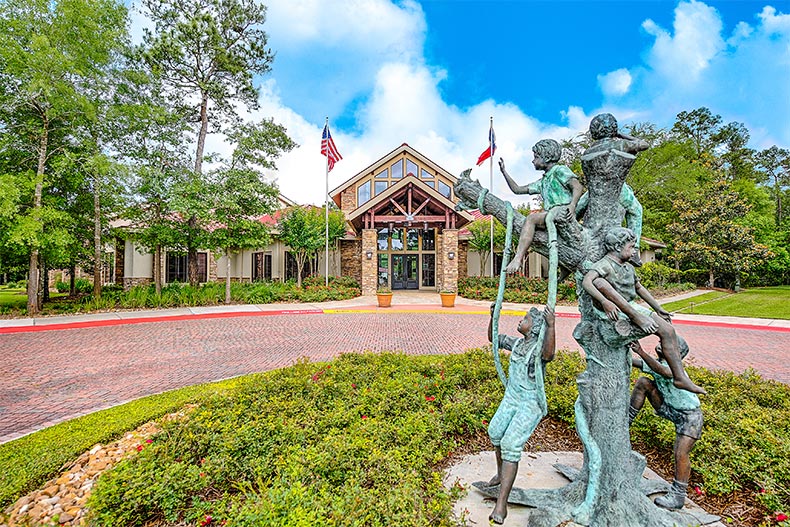 View of the sculpture outside the Windsor Lodge at Windsor Lakes in The Woodlands, Texas