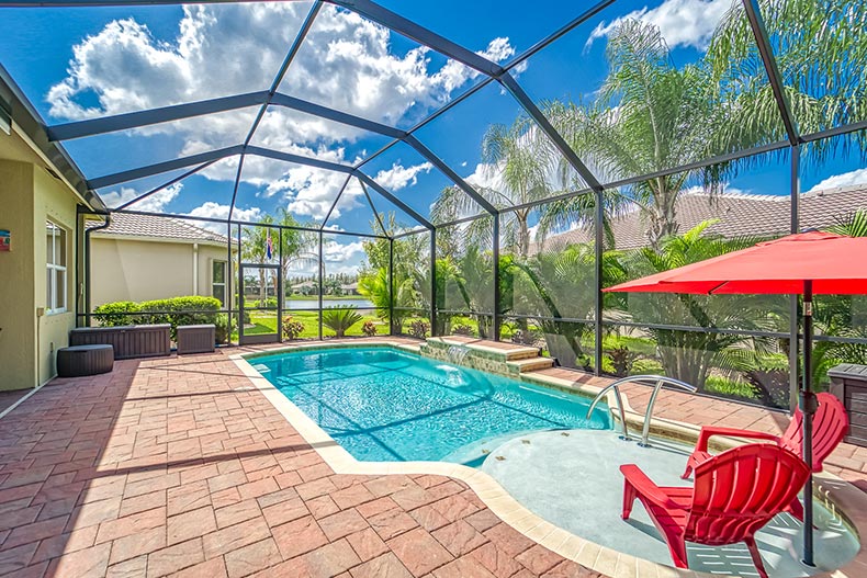 An indoor pool attached to a model home at Valencia Lakes in Wimauma, Florida