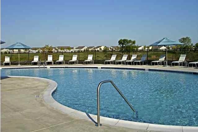 The spacious outdoor swimming pool is a popular resident destination to savor summer days in Illinois.