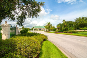 Spruce Creek Country Club in Summerfield impresses with a winding entry and private gatehouse.