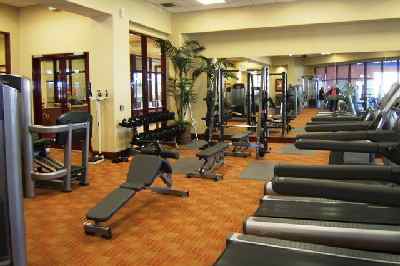 A state-of-the-art fitness center includes the latest high-end cardiovascular and weight training equipment.