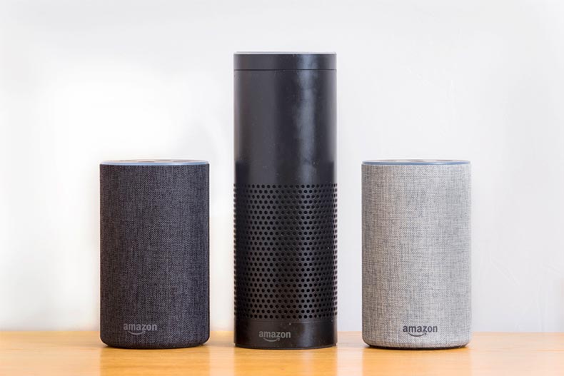 Three different models of an Amazon Echo Alexa Smart Speaker