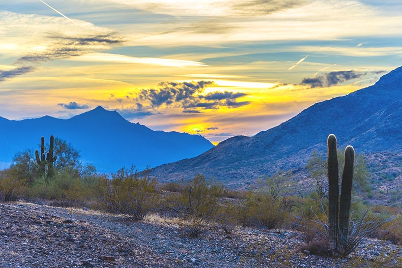 Photo of a sunset over Estrella Mountain in Maricopa County, Arizona