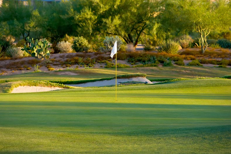 A flag marking the hole on a golf course in Arizona