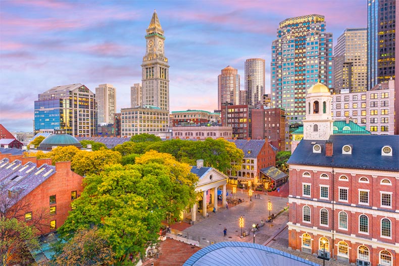 Boston skyline at dusk with Faneuil Hall and Quincy Market in view