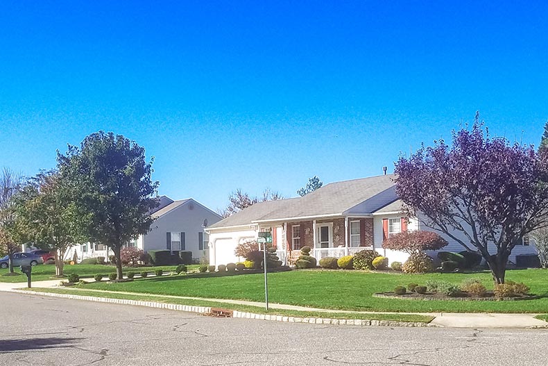 Homes lining a residential street on a sunny day at Brookhollow in Mickleton, New Jersey