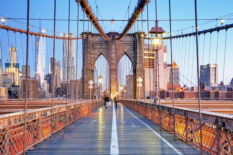 Evening view down the Brooklyn Bridge in New York City