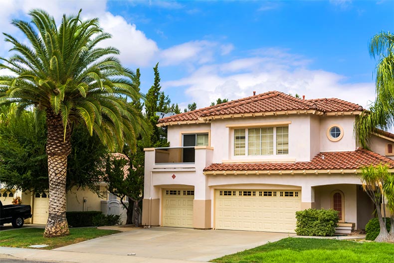 A palm tree beside a single-family house in Temecula City, California