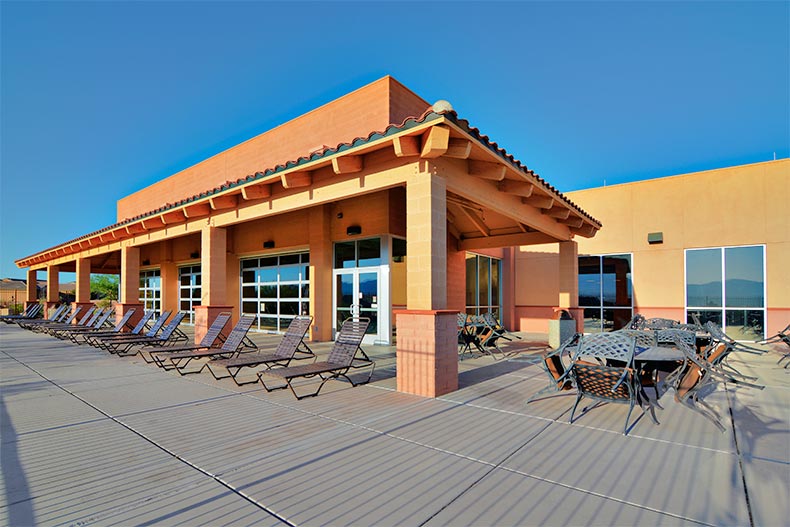 Lounge chairs on an outdoor patio at Las Campanas in Green Valley, Arizona
