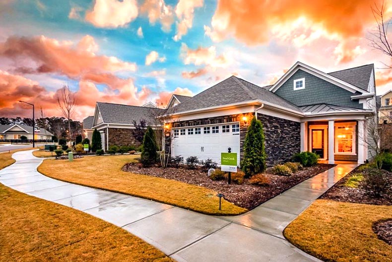 Exterior of a model home in Carolina Arbors at sunset, located in Durham, North Carolina