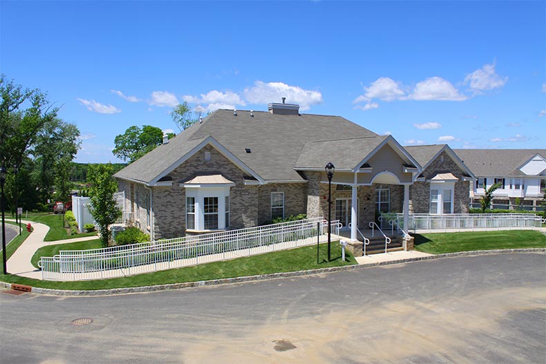 Exterior view of a community building at Chelsea Square in Morganville, New Jersey