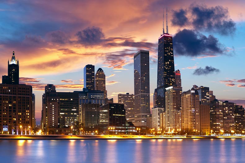 View from across Lake Michigan of the Chicago skyline at dusk