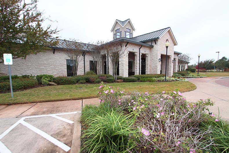 Exterior photo of the clubhouse at Heritage Grand at Cinco Ranch in Katy, Texas