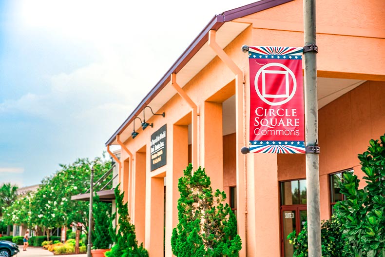 Exterior photo of a building in Circle Square Commons, the entertainment hub of On Top of The World in Ocala, Florida