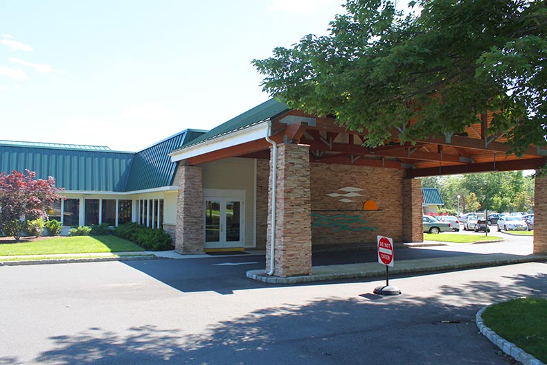 Exterior photo of the clubhouse at the Clearbrook 55+ community in Monroe, New Jersey