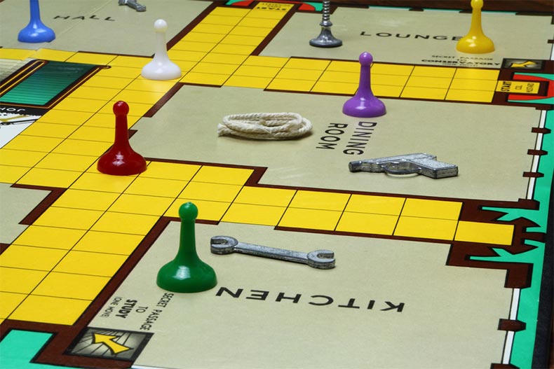 Close up of game pieces and board of Clue