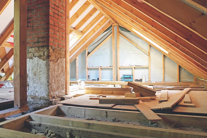 An interior view of a house attic under construction