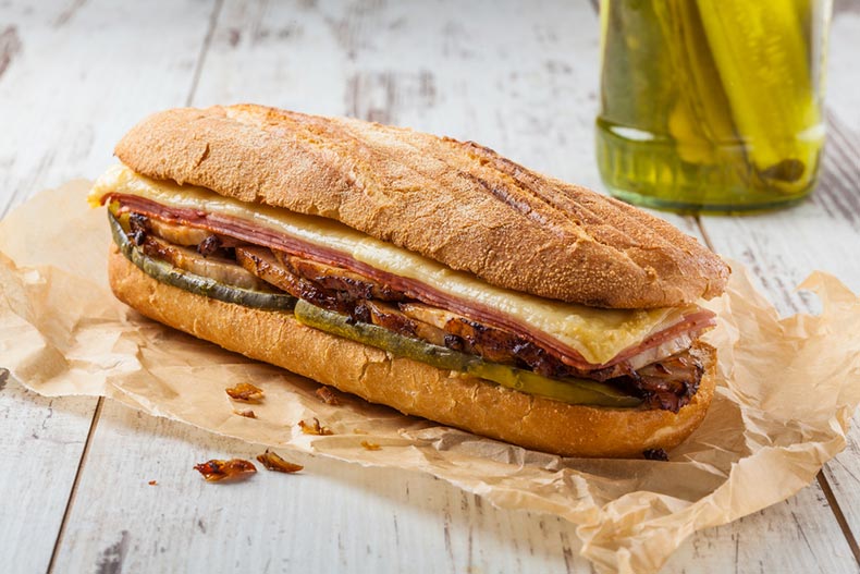 A traditional Cuban Sandwich with ham, pork, and cheese