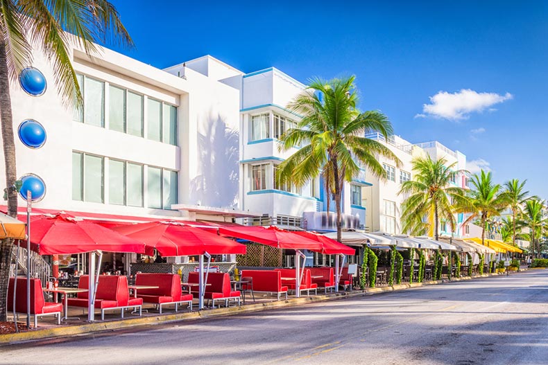 Cafes and palm trees on Ocean Drive in Miami Beach, Florida