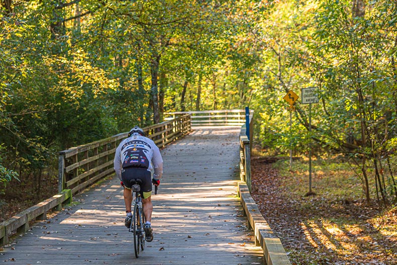 A biker on The Big Creek Greenway in Cumming, Georgia