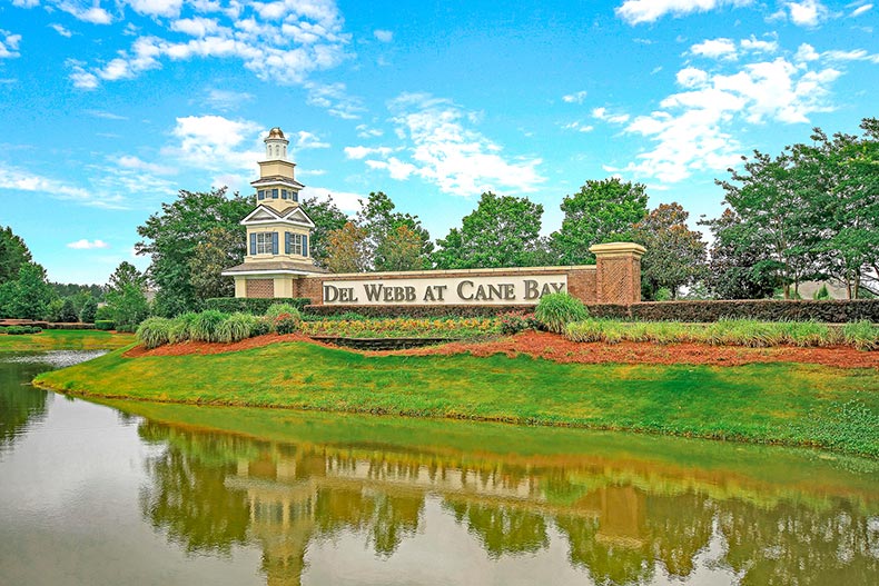 A creek in front of the community sign at Del Webb at Cane Bay in Summerville, South Carolina